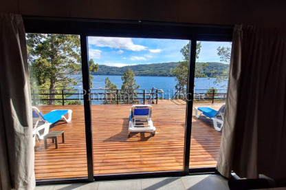 Propiedad en Módulos, Living - Cocina con Barra para el Desayuno, 2 Dorm matrimoniales con baño en suite. Km 14. Capacidad 4 personas Casa con Costa de Lago 2 Dormitorios Matrimoniales con Baño en suite